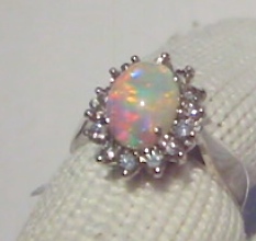 Custom Black Opal Rings.