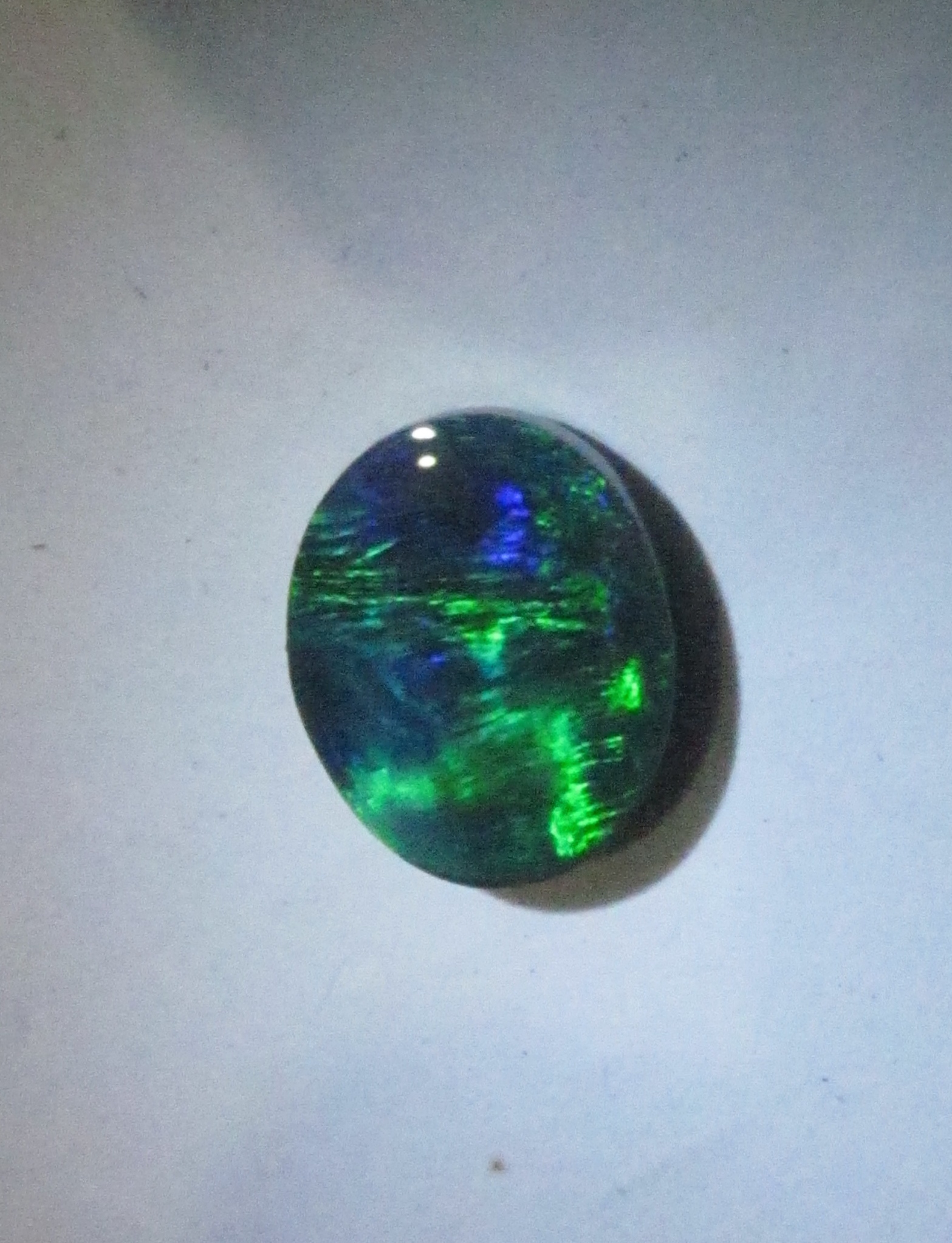 Black Opal Gemstone Opal 11.3X7.4X4MM   Ethiopia Black Opal Cabochon Gemstone,1.80 Carat,Oval Shape 100%  Gemstone.