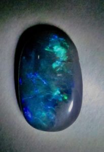  opal gemstone mixed blue green colours.