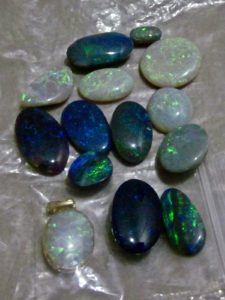 Parcel of Australian opal gemstones.
