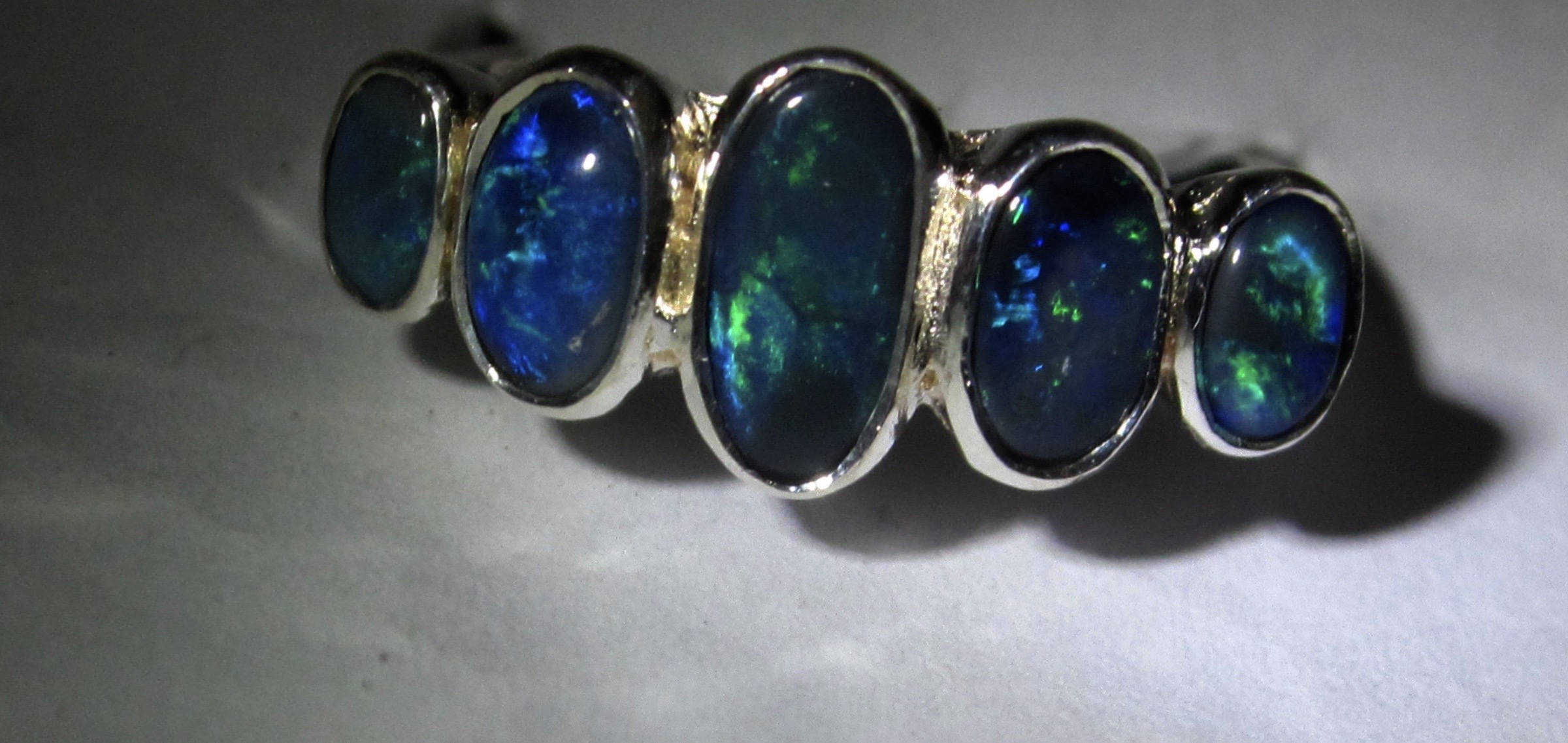 About Opals Gemstones .